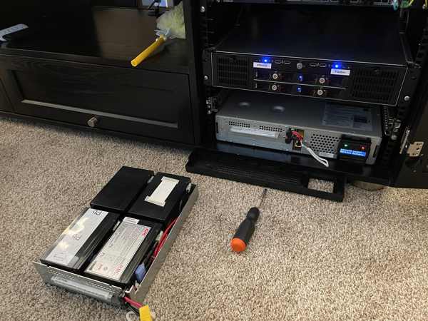 An image of a rack mount UPS with callout text pointing to the main chassis saying 